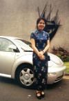 Kay by Soni's new car at the wedding